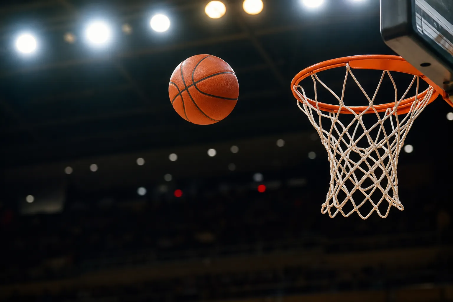 Basketball near the hoop illustrating spread and player prop betting